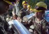 Risky rescue attempt under way for Thai cave boys as world prays